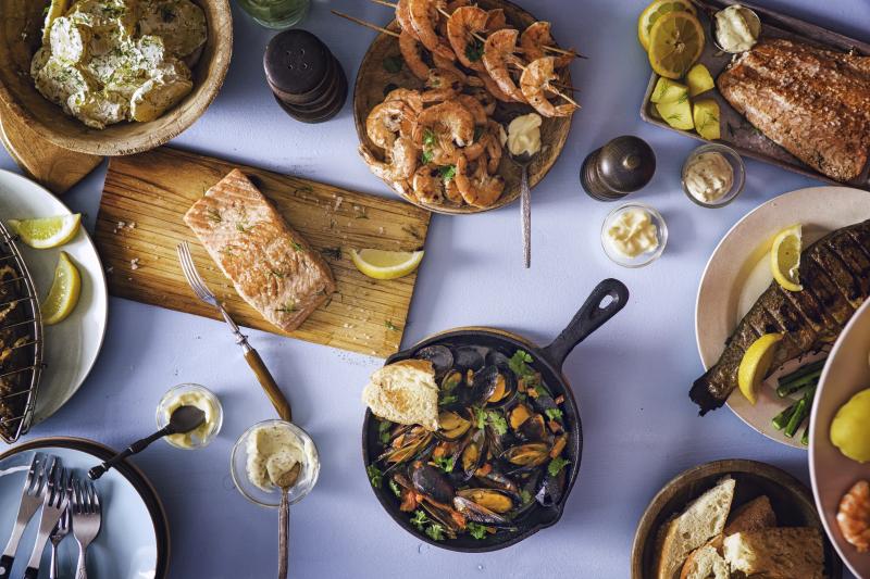 Table with fish and shellfish dishes