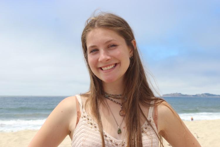 Alexandra Fiske stands on a beach in Half Moon Bay, California. 